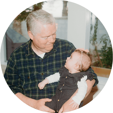 Grandparent holding a baby