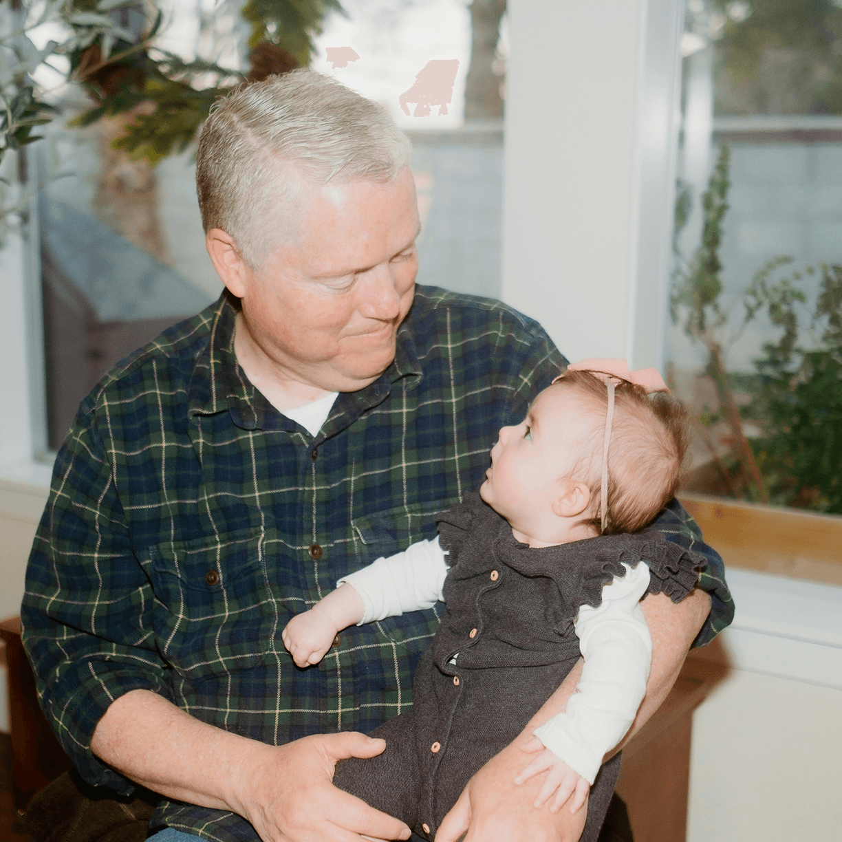 Grandparent holding a baby